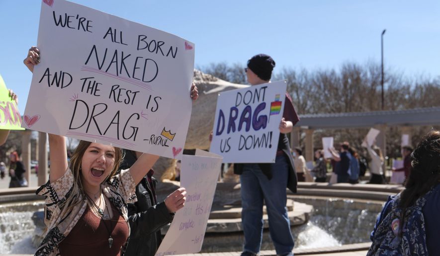 More than 50 people gathered Tuesday, March 21, 2023, at West Texas A&M University in Canyon, Texas, to protest the university president's decision to cancel a drag show on campus. (Michael Cuviello/Amarillo Globe-News via AP)