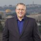 Evangelical author Joel C. Rosenberg, who also hosts a weekly program on TBN, a Christian network, praised Israeli Prime Minister Benjamin Netanyahu for blocking an anti-evangelism bill proposed in the country&#x27;s Knesset, or parliament. (Photo courtesy TBN.)