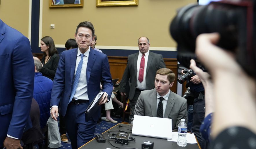 TikTok CEO Shou Zi Chew returns from a break as he testifies during a hearing of the House Energy and Commerce Committee, on the platform&#x27;s consumer privacy and data security practices and impact on children, Thursday, March 23, 2023, on Capitol Hill in Washington. (AP Photo/Alex Brandon)