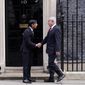 Britain&#x27;s Prime Minister Rishi Sunak, left, welcomes Israel Prime Minister Benjamin Netanyahu at Downing Street in London, Friday, March 24, 2023.(AP Photo/Alberto Pezzali)