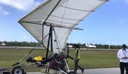 In this photo, provided by the Monroe County Sheriff&#x27;s Office via the Florida Keys News Bureau, Key West International Airport personnel examine an ultralight aircraft that landed illegally at the airport carrying two Cuban men Saturday, March 25, 2023, in Key West, Fla. An airport spokesperson reported that both men were uninjured and were taken into custody by the Sheriff&#x27;s Office. There were no interruptions in service and operations continue as normal, airport officials added. (Monroe County Sheriff&#x27;s Office /the Florida Keys News Bureau via AP)