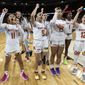 Maryland players celebrate their victory over Notre Dame and advancing to the Elite Eight after a Sweet 16 college basketball game at the NCAA Tournament in Greenville, S.C., Saturday, March 25, 2023. (AP Photo/Mic Smith)