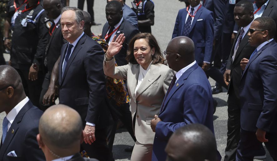 U.S. Vice President Kamala Harris waves as she arrives in Accra, Ghana, Sunday, March 26, 2023. Harris is on a seven-day African visit that will also take her to Tanzania and Zambia. (AP Photo/Misper Apawu)