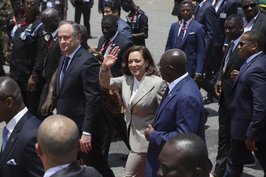 U.S. Vice President Kamala Harris waves as she arrives in Accra, Ghana, Sunday, March 26, 2023. Harris is on a seven-day African visit that will also take her to Tanzania and Zambia. (AP Photo/Misper Apawu)