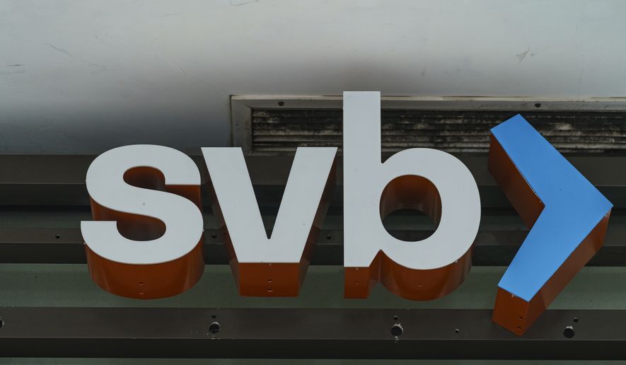The Silicon Valley Bank logo is seen at an open branch in Pasadena, Calif., on March 13, 2023. The Federal Deposit Insurance Corp. says First Citizens will acquire much of Silicon Valley Bank, whose collapse has rattled the banking industry (AP Photo/Damian Dovarganes, File)