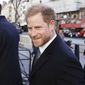Britain&#x27;s Prince Harry, center, arrives at the Royal Courts Of Justice, in London, Monday, March 27, 2023. Prince Harry was in a London court on Monday as the lawyer for a group of British tabloids prepared to ask a judge to toss out lawsuits by the prince, Elton John and several other celebrities who allege phone tapping and other invasions of privacy. (Jordan Pettitt/PA Wire/PA via AP)