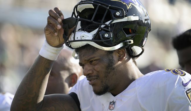 Baltimore Ravens quarterback Lamar Jackson (8) leaves the field after the end of the first half of an NFL football game against the Jacksonville Jaguars, Sunday, Nov. 27, 2022, in Jacksonville, Fla. Lamar Jackson said Monday, March 27, 2023, he has requested a trade from the Ravens. (AP Photo/Phelan M. Ebenhack) **FILE**