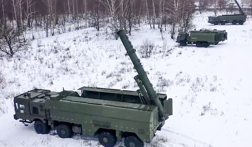 In this photo taken from video provided by the Russian Defense Ministry Press Service on Tuesday, Jan. 25, 2022, The Russian army&#x27;s Iskander missile launchers take positions during drills in Russia. Russian President Vladimir Putin has said that Russia has helped upgrade 10 Belarusian aircraft to make them capable to carry nuclear weapons and also provided Belarus with nuclear-capable Iskander short range missiles as Moscow plans to station nuclear weapons in Belarus. (Russian Defense Ministry Press Service via AP, File)