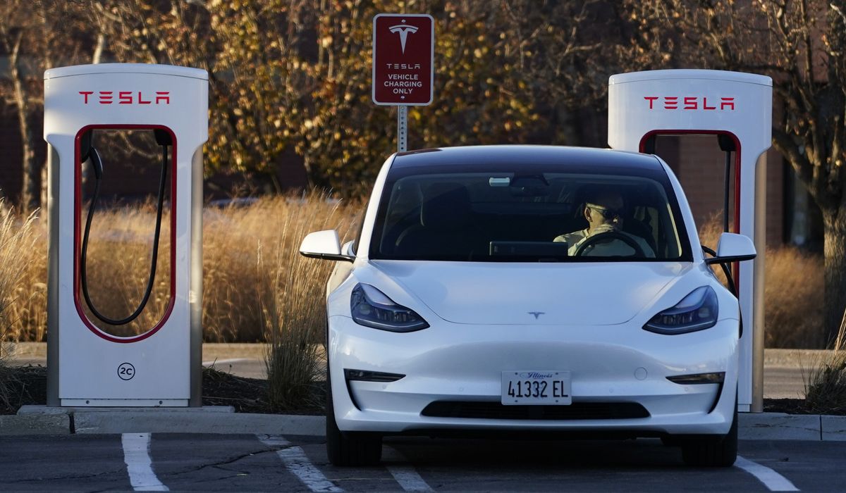 NextImg:Biden reignites furor over electric vehicle tax credits