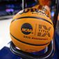 A basketball with an NCAA logo and a Title IX inscription rests on a rack before a First Four game between Illinois and Mississippi State at the NCAA women&#x27;s college basketball tournament Wednesday, March 15, 2023, in South Bend, Ind. The NCAA, the organization that governs college athletics, was once at the forefront of hot-button issues such as the Confederate flag and transgender rights. But that stance evolved quickly as one Republican-controlled state after another rushed to pass laws that on everything from abortion to transgender rights. The NCAA’s new approach came into sharper focus this week as Texas prepares to host both the men’s and women’s Final Four. (AP Photo/Michael Caterina, File) **FILE**