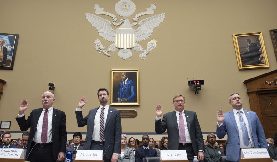 Members of the Washington, D.C. government are sworn-in before testifying during a House Oversight and Accountability Committee&#x27;s hearing about Congressional oversight of the Nation&#x27;s Capital, Wednesday, March 29, 2023, on Capitol Hill in Washington. From left; D.C. Council Chairman Phil Mendelson, Council Member Charles Allen, CFO Glen Lee, and D.C. Police Union Chairman Greggory Pemberton. (AP Photo/Cliff Owen)
