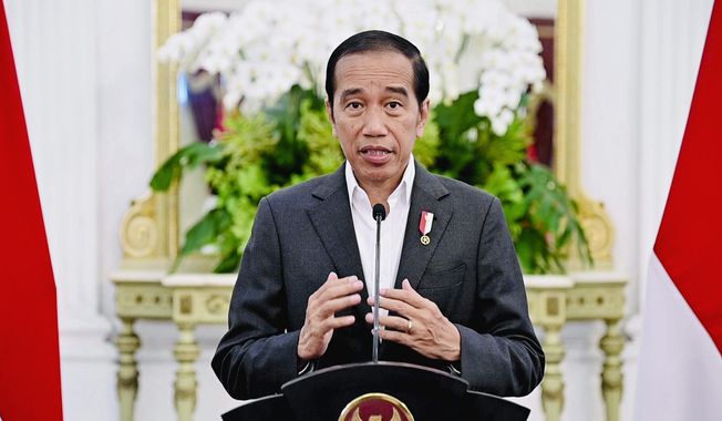 In this photo released by the Press and Media Bureau of the Indonesian Presidential Palace, Indonesian President Joko Widodo delivers his statement at Merdeka Palace in Jakarta, Indonesia, Tuesday, March 28, 2023. Widodo said Tuesday that his administration is trying to save the FIFA Under-20 World Cup following the cancelation of the official draw for group assignments in the youth soccer tournament, after regional governors and protesters demanded Israel&#x27;s team be excluded. (Indonesian Presidential Palace via AP)
