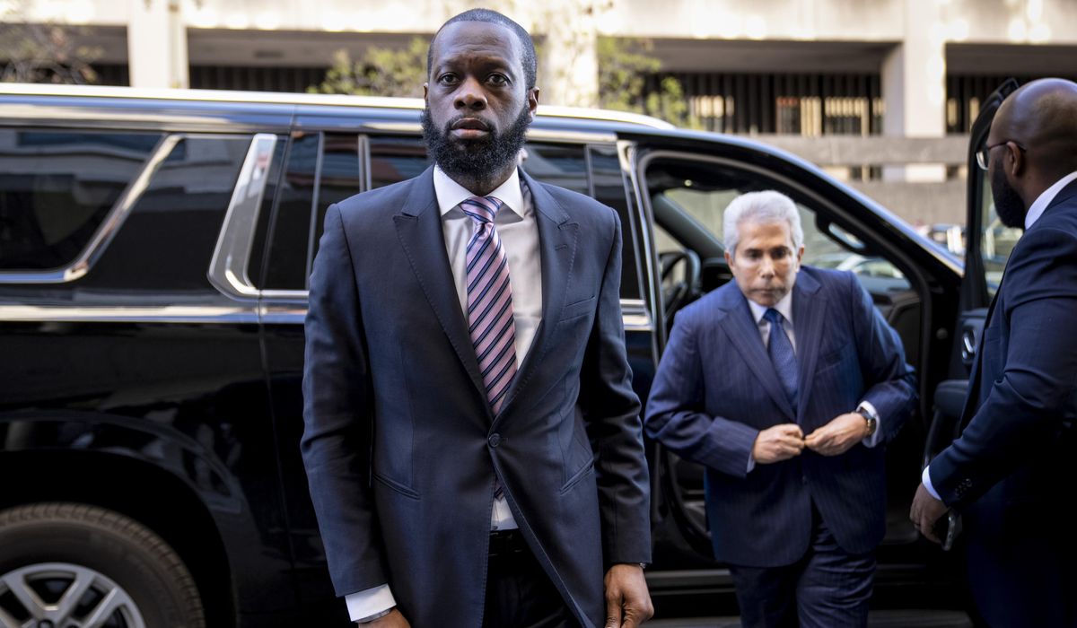 NextImg:Fugees rapper’s multimillion-dollar political conspiracy trial opens