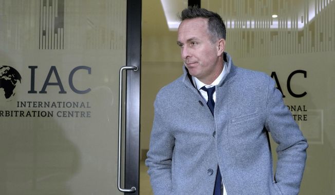 Former England cricket team captain Michael Vaughan leaves the International Arbitration Centre, in London, Friday, March. 3, 2023. Former England cricket captain Michael Vaughan says a disciplinary panel has dismissed a charge against him alleging he made a racially aggravated remark toward a group of Yorkshire teammates of Asian ethnicity in 2009. The verdict marks the latest stage of a scandal that erupted when Azeem Rafiq went public in 2020 saying he had been the victim of racial harassment and bullying at Yorkshire. (AP Photo/Kirsty Wigglesworth, File)