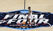San Diego State guard Lamont Butler drives up court against Florida Atlantic during the first half of a Final Four college basketball game in the NCAA Tournament on Saturday, April 1, 2023, in Houston. (AP Photo/Godofredo A. Vasquez)