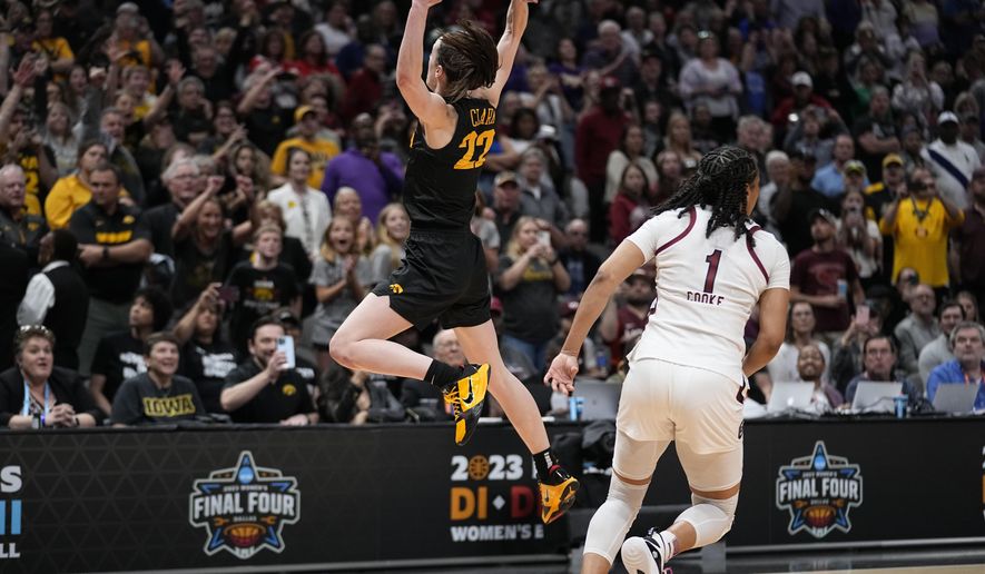 Iowa&#x27;s Caitlin Clark reacts after the second half of an NCAA Women&#x27;s Final Four semifinals basketball game against South CarolinaFriday, March 31, 2023, in Dallas. Iowa won 77-73 to advance to the championship on Sunday. (AP Photo/Tony Gutierrez)