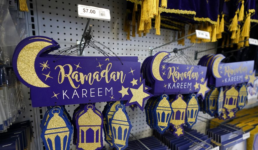 Ramadan decorations are displayed at a Party City store in Dearborn, Mich., on Thursday, March 23, 2023. More businesses are selling Ramadan and Eid items, including DIY kits, lanterns and napkin holders. It&#x27;s one of the latest signs of big U.S. retailers catering to American Muslim shoppers. Many Muslim Americans enthusiastically welcomed the recognition, applauding those retailers that are making it easier for them to bring their families the cheer that ubiquitously and publicly marks some other faiths&#x27; holidays. (AP Photo/Carlos Osorio)