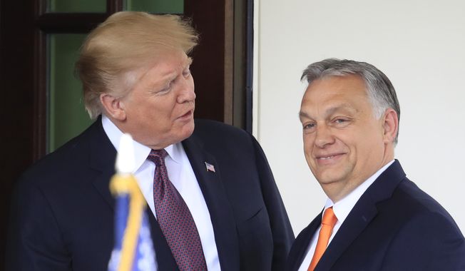 President Donald Trump welcomes Hungarian Prime Minister Viktor Orban to the White House in Washington, on May 13, 2019. Orban, tweeted a message of support for former U.S. President Donald Trump on Monday, April 3, 2023 urging him to “keep on fighting” as he faces a criminal indictment for making hush payments during his 2016 presidential campaign. (AP Photo/Manuel Balce Ceneta, File)