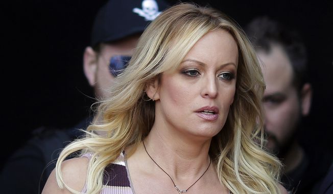 Adult film actress Stormy Daniels arrives for the opening of the adult entertainment fair Venus in Berlin, Oct. 11, 2018. An appeals court ruled Tuesday, April 4, 2023, that Daniels must pay nearly $122,000 of Donald Trump&#x27;s legal fees that were racked up in connection with the porn actor&#x27;s failed defamation lawsuit. The ruling in Los Angeles came as Trump also faced a criminal case related to alleged hush money he paid to Daniels and another woman who claimed he had affairs with them. (AP Photo/Markus Schreiber, File)