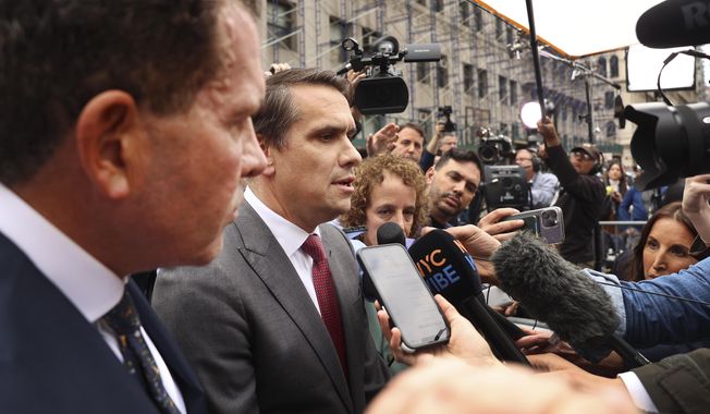 Former President Donald Trump&#x27;s defense team, from left, Joseph Tacopina, Todd Blanche and Susan Necheles, answer questions for the media outside Manhattan criminal court, Tuesday, April 4, 2023, in New York. Trump appeared in a New York City courtroom on charges related to falsifying business records in a hush money investigation, the first president ever to be charged with a crime. (AP Photo/Yuki Iwamura)