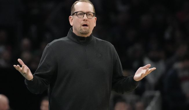 Toronto Raptors coach Nick Nurse reacts to a call during the first half of the team&#x27;s NBA basketball game against the Boston Celtics, Wednesday, April 5, 2023, in Boston. (AP Photo/Charles Krupa)