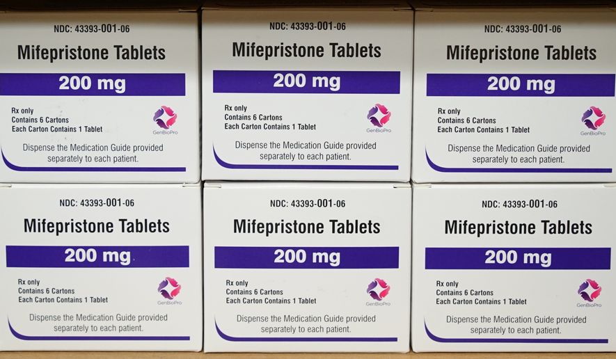 Boxes of the drug mifepristone sit on a shelf at the West Alabama Women&#x27;s Center in Tuscaloosa, Ala., March 16, 2022. A federal judge in Texas on Friday, April 7, 2023, ordered a hold on the U.S. approval of the abortion medication mifepristone, throwing into question access to the nation’s most common method of abortion in a ruling that waved aside decades of scientific approval. Federal lawyers representing the FDA are expected to swiftly appeal the ruling. (AP Photo/Allen G. Breed, File)