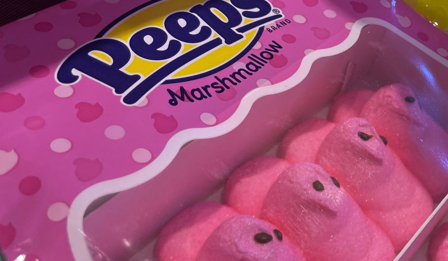 Marshmallow Peeps candy is on display at a store in Lafayette, Calif., on March 24, 2023. A California lawmaker wants to ban certain types of chemical additives in food dyes used in popular candies like Skittles and Peeps. They are already banned in the European Union based on public health concerns. (AP Photo/Haven Daley)