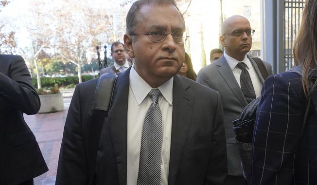 Ramesh &quot;Sunny&quot; Balwani, the former lover and business partner of Theranos CEO Elizabeth Holmes, arrives at federal court in San Jose, Calif., on Dec. 7, 2022. Balwani was sentenced Wednesday, April 5, 2023 to nearly 13 years in prison for his role in the company’s blood-testing hoax — a punishment slightly longer than that given to the CEO, who was his lover and accomplice in one of Silicon Valley’s biggest scandals.(AP Photo/Jeff Chiu, File)