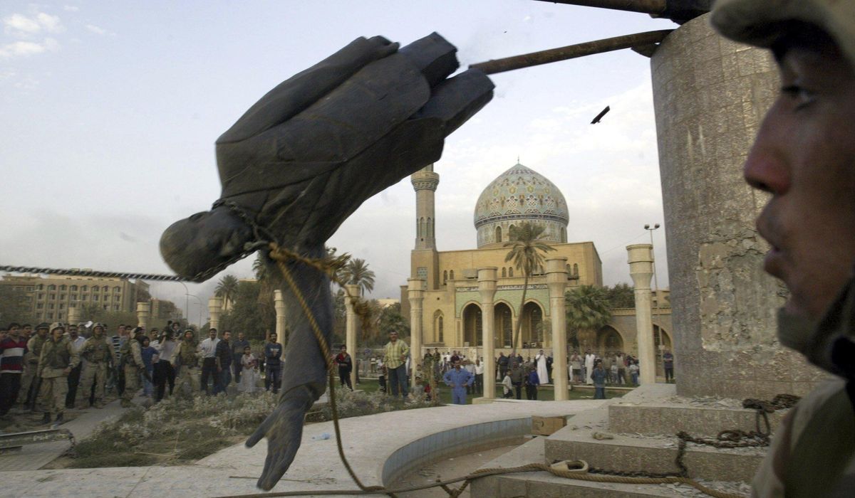NextImg:Once everywhere, Saddam’s image scrubbed from Baghdad