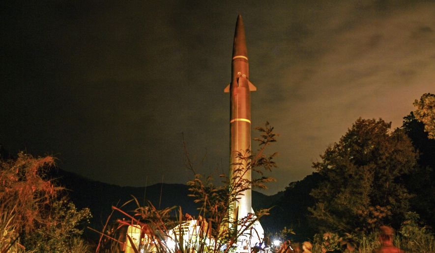 In this photo released by Xinhua News Agency, a missile from the rocket force of the Eastern Theater Command of the Chinese People's Liberation Army (PLA) takes part in operations during the combat readiness patrol and military exercises around the Taiwan Island on Saturday, April 8, 2023. China's military declared Monday it is "ready to fight" after completing three days of large-scale combat exercises around Taiwan that simulated sealing off the island in response to the Taiwanese president's trip to the U.S. last week. (Liu Mingsong/Xinhua via AP)