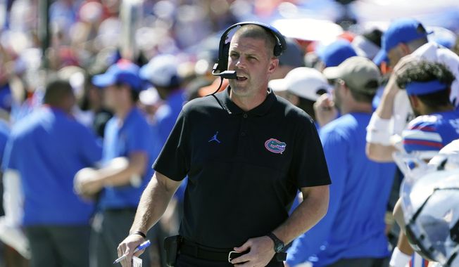 Florida head coach Billy Napier paces the sidelines during the first half of an NCAA college football game against Missouri, Saturday, Oct. 8, 2022, in Gainesville, Fla. Florida Victorious formally launched Tuesday, April 11, 2023, with hopes of raising money to fund NIL deals for student-athletes — and ultimately help the Gators get back to national prominence in football and men’s basketball.(AP Photo/John Raoux, File)