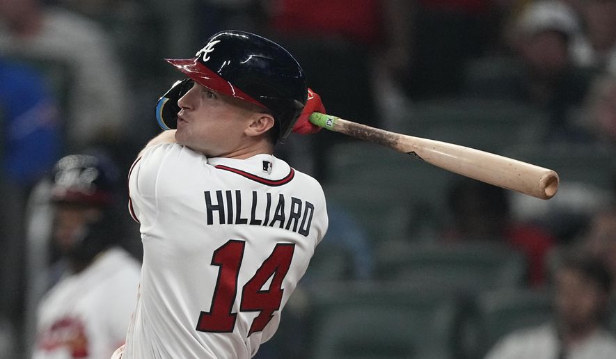 Atlanta Braves&#x27; Sam Hilliard drives in a run with a double in the fourth inning of a baseball game against the Cincinnati Reds Tuesday, April 11, 2023, in Atlanta. (AP Photo/John Bazemore) **FILE**