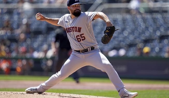 Houston Astros starting pitcher Jose Urquidy delivers during the first inning of a baseball game against the Pittsburgh Pirates in Pittsburgh, Wednesday, April 12, 2023. (AP Photo/Gene J. Puskar)
