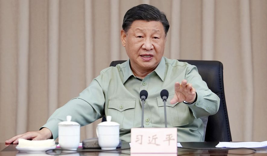 In this photo released by Xinhua News Agency, Chinese President Xi Jinping, also general secretary of the Communist Party of China Central Committee and chairman of the Central Military Commission, delivers a speech at the navy headquarters of the Southern Theater Command of the People&#x27;s Liberation Army (PLA) in Zhanjiang in southern China&#x27;s Guangdong province on Tuesday, April 11, 2023. Xi on Tuesday inspected the navy of the Southern Theater Command of the PLA. (Li Gang/Xinhua via AP) **FILE**