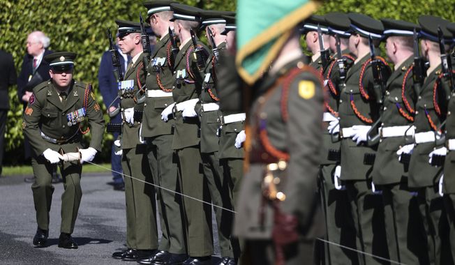 Members of the Captain&#x27;s Honour Guard from the 27th Infantry battalion of the Irish Army line up ahead of an inspection by President Joe Biden at the Aras Uachtarainin the official residence of the Irish President Michael Higgins in Dublin Ireland, Thursday, April 13, 2023. (AP Photo/Peter Morrison)