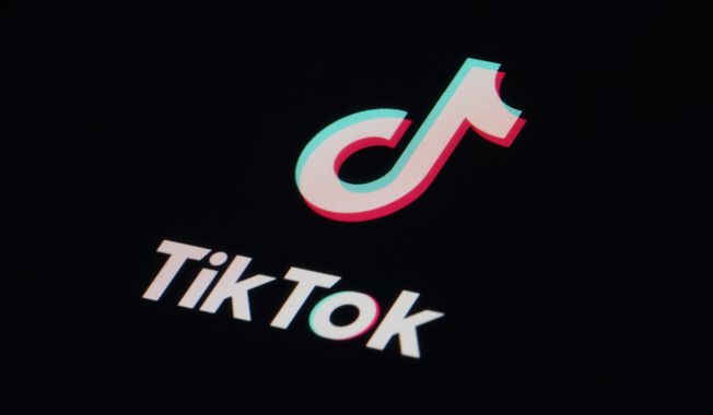 FILE - The icon for the video sharing TikTok app is seen on a smartphone, Feb. 28, 2023, in Marple Township, Pa. Montana lawmakers were expected to take a big step forward Thursday, April 13, 2023 on a bill to ban TikTok from operating in the state. It&#x27;s a move that’s bound to face legal challenges but also serve as a testing ground for the TikTok-free America that many national lawmakers have envisioned. (AP Photo/Matt Slocum, File)
