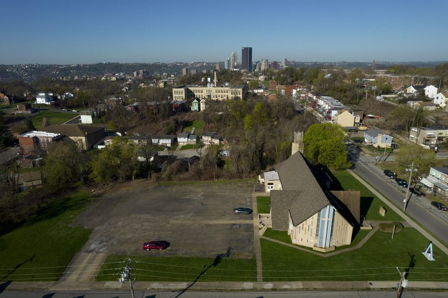 Considered the city's oldest Black congregation, Bethel AME now sits in the Middle Hill District of Pittsburgh on Thursday, April 13, 2023. The congregation lost its previous sanctuary when much of Pittsburgh's historic Lower Hill District was razed in the 1950s, making way for an arena and expressway in an urban renewal project. More than 60 years later, in what's being called a step toward "restorative justice," the church is poised to obtain use of a 1.5-acre parcel near its former site in an agreement with the Pittsburgh Penguins, holders of development rights to the area. (AP Photo/Jessie Wardarski)