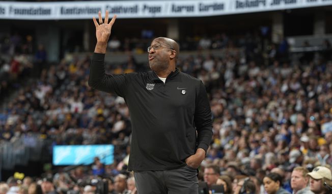 Sacramento Kings head coach Mike Brown directs his team against the Denver Nuggets in the second half of an NBA basketball game Sunday, April 9, 2023, in Denver. (AP Photo/David Zalubowski) **FILE**