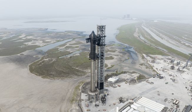 This undated photo provided by SpaceX shows the company&#x27;s Starship rocket at the launch site in Boca Chica, Texas. (SpaceX via AP)