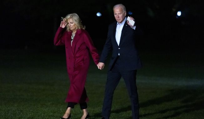 President Joe Biden and first lady Jill Biden return to the White House after a weekend in Delaware following their visit to Ireland and Northern Ireland, in Washington, Sunday, April 16, 2023. (AP Photo/J. Scott Applewhite)