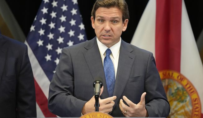 Florida Gov. Ron DeSantis speaks at a news conference at the Reedy Creek Administration Building Monday, April 17, 2023, in Lake Buena Vista, Fla. DeSantis and Florida lawmakers ratcheted up pressure on Walt Disney World on Monday by announcing legislation that will use the regulatory powers of Florida government to exert unprecedented oversight on the park resort&#x27;s rides and monorail. (AP Photo/John Raoux)