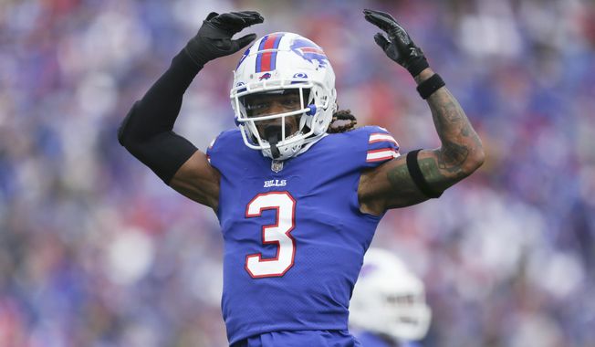 Buffalo Bills safety Damar Hamlin reacts after a play during the first half of the team&#x27;s NFL football game against the Pittsburgh Steelers on Oct. 9, 2022, in Orchard Park, Hamlin has been cleared to resume playing and is attending the team’s voluntary workout program some four months after going into cardiac arrest and having to be resuscitated on the field during a game at Cincinnati, general manager Brandon Beane said Tuesday, April 18, 2023. (AP Photo/Joshua Bessex, File)
