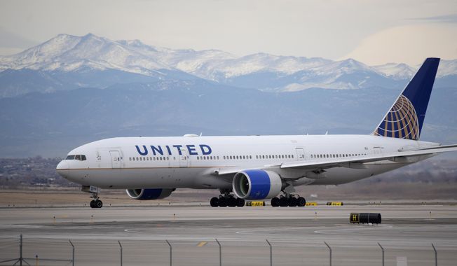 A United Airlines jetliner taxis to a runway for take-off from Denver International Airport, Dec. 27, 2022. United Airlines reports earnings on Tuesday, April 18, 2023. (AP Photo/David Zalubowski, File)