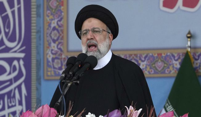 Iranian President Ebrahim Raisi speaks during during Army Day parade in front of the mausoleum of the late revolutionary founder Ayatollah Khomeini just outside Tehran, Iran, Tuesday, April 18, 2023. President Raisi reiterated threats against Israel while though he stayed away from criticizing Saudi Arabia as Tehran seeks a détente with the kingdom. (AP Photo/Vahid Salemi) ** FILE **