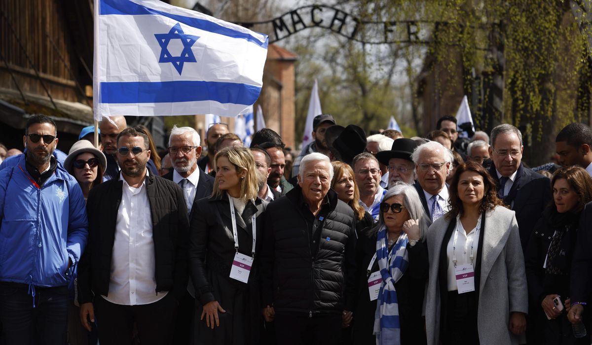 NextImg:Patriots owner Kraft joined by Meek Mill for Holocaust march