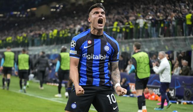 Inter Milan&#x27;s Lautaro Martinez celebrates after scoring his side&#x27;s second goal during the Champions League quarterfinal second leg soccer match between Inter Milan and Benfica at the San Siro stadium in Milan, Italy, Wednesday, April 19, 2023. (AP Photo/Luca Bruno)