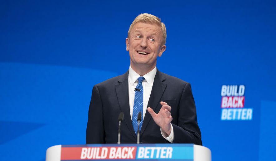 Oliver Dowden speaks at the Conservative Party Conference in Manchester, England, on Oct. 3, 2021. U.K. officials say Russian hackers are seeking to “disrupt or destroy” Britain’s critical infrastructure and not enough is being done to stop them. Britain’s National Cybersecurity Center has issued an official threat notice to operators of Britain’s electricity, water and other critical systems, telling them to boost their defenses. Cabinet Minister Oliver Dowden said the threat comes from hackers sympathetic to Russia though not necessarily directed by the Russian state. (AP Photo/Jon Super) **FILE**