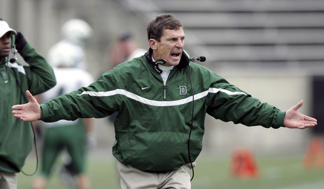 Dartmouth&#x27;s coach Buddy Teevens gestures on the sidelines during a football game against Princeton in Princeton, N.J., Nov. 18, 2006. Teevens had his right leg amputated following a bicycle accident last month in St. Augustine, Florida. (AP Photo/Mel Evans, File)