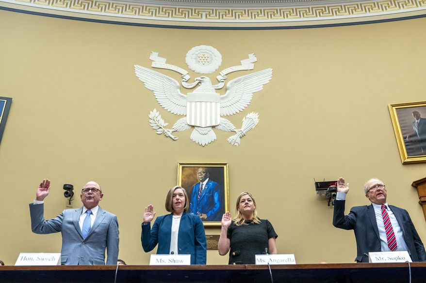 Department of Defense Inspector General Robert Storch, left, State Department Acting Inspector General Diana Shaw, USAID Acting Deputy Inspector General Nicole Angarella, and Special Inspector General for Afghanistan Reconstruction (SIGAR) John Sopko, are sworn in during a hearing of the House Oversight and Accountability Committee concerning the U.S. withdrawal from Afghanistan, on Capitol Hill, Wednesday, April 19, 2023, in Washington. (AP Photo/Alex Brandon)