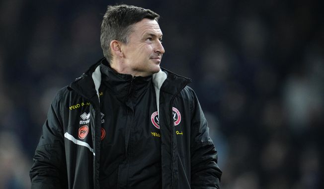 Sheffield&#x27;s manager Paul Heckingbottom smiles during the FA Cup 4th round soccer match between Sheffield United and Wrexham at the Bramall Lane stadium in Sheffield, England, on Feb. 7, 2023. It has been 15 years since a team from outside the Premier League reached the FA Cup final. Sheffield United is looking to end that wait even if it is not the priority in a defining few days for the club with plenty on its plate. (AP Photo/Jon Super, File)